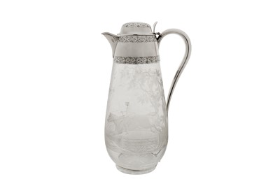Lot 384 - A Victorian sterling silver mounted claret jug, London 1887 by Ephraim Tysall (reg. 2nd April 1867)
