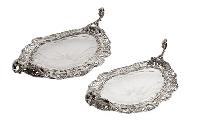 Lot 343 - A pair of Edwardian sterling silver mounted glass dishes, London 1906 by Wiliam Comyns