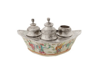 Lot 172 - A late 19th century silver ink well, upon a Chinese porcelain dish