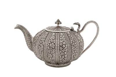 Lot 92 - A late 19th century Anglo - Indian unmarked silver teapot, Kashmir circa 1890