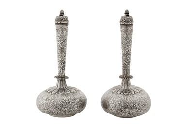 Lot 100 - A pair of late 19th century Anglo – Indian unmarked silver small water bottles (surhai), Lucknow circa 1880