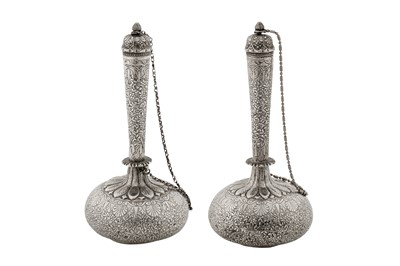 Lot 100 - A pair of late 19th century Anglo – Indian unmarked silver small water bottles (surhai), Lucknow circa 1880