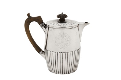 Lot 428 - A George III sterling silver hot water or coffee pot, London 1798, maker’s mark obscured