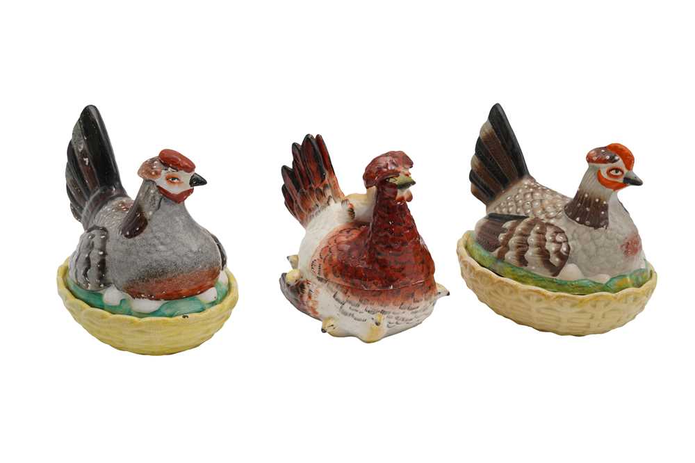 Lot 113 - THREE VICTORIAN STAFORDSHIRE POTTERY CHICKEN FORM EGG CROCKS