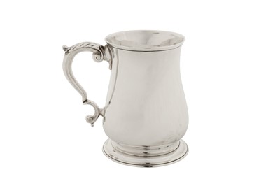 Lot 461 - A George II sterling silver pint mug, London 1750 by John Robinson II