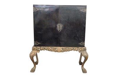 Lot 148 - A 19TH CENTURY BLACK LACQUERED CABINET ON GILTWOOD STAND