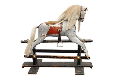 Lot 426 - A LATE VICTORIAN CARVED WOODEN ROCKING HORSE