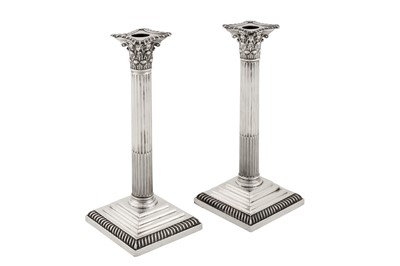 Lot 344 - A pair of Edwardian sterling silver candlesticks, London 1903 by William Hutton and Sons