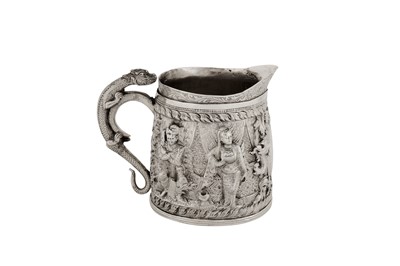 Lot 138 - A late 19th century Burmese unmarked silver milk jug, Thayetmyo circa 1880
