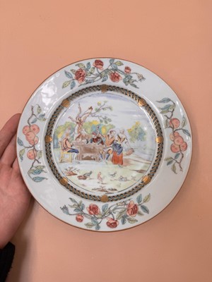 Lot 38 - A CHINESE EXPORT FAMILLE ROSE 'CARD PLAYERS' DISH AFTER DAVID TENIERS