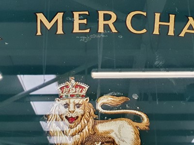 Lot 164 - A REVERSE GLASS PAINTED ROYAL WARRANT SIGN, CIRCA 1936