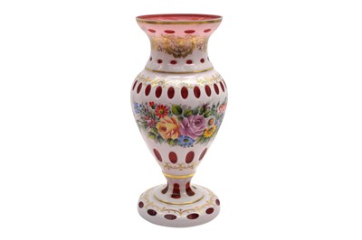 Lot 125 - A LARGE BOHEMIAN RUBY GLASS VASE WITH WHITE OVERLAY, MID 20TH CENTURY
