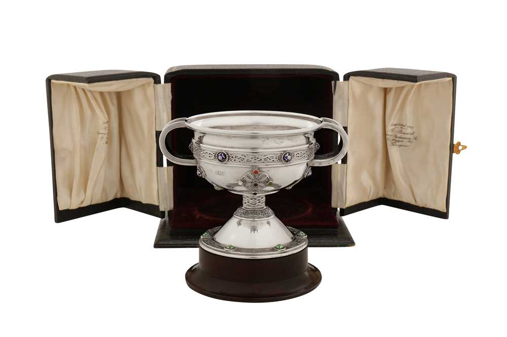 Lot 340 - A cased George V Irish sterling silver and enamel replica of the Ardagh chalice, Dublin 1917 by Robert Stweart of Glasgow