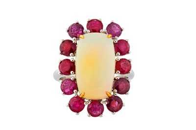 Lot 143 - AN OPAL AND RUBY RING