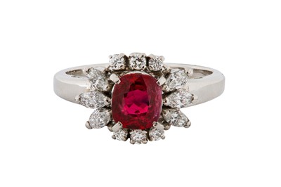Lot 140 - A RUBY AND DIAMOND CLUSTER RING