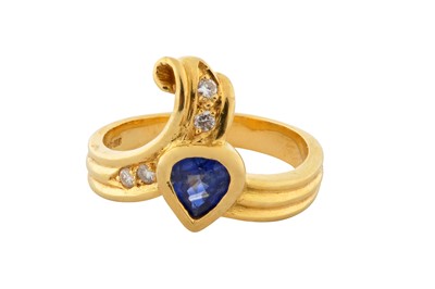 Lot 208 - A SAPPHIRE AND DIAMOND RING, CIRCA 1990