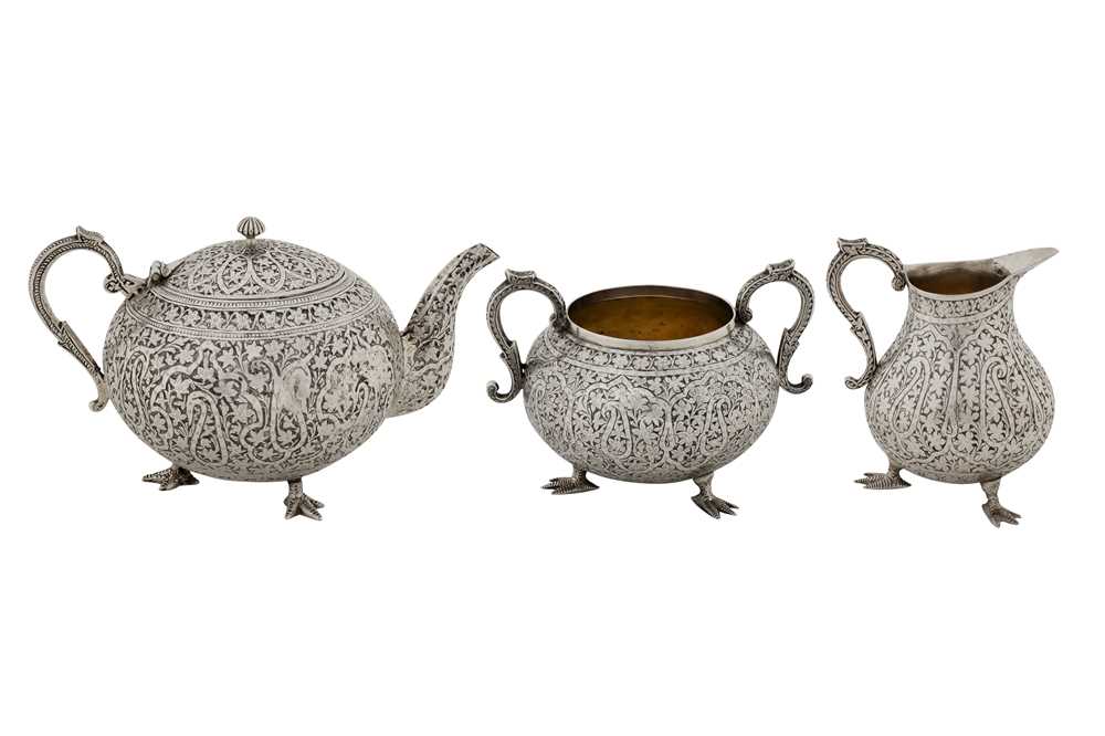 Lot 90 - A late 19th century Anglo – Indian unmarked silver three-piece bachelor tea service, Kashmir circa 1890