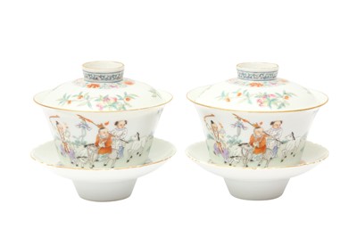 Lot 316 - A PAIR OF CHINESE FAMILLE-ROSE CUPS, COVERS AND STANDS