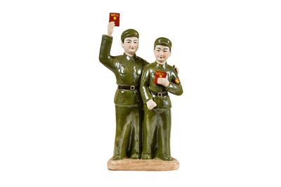 Lot 143 - A Chinese Cultural Revolution Era Glazed Bisque Porcelain Figural Group