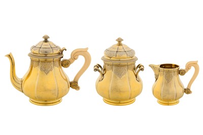 Lot 252 - A late 19th century French 950 standard silver gilt three-piece tea service, Paris circa 1890 by Boin - Taburet