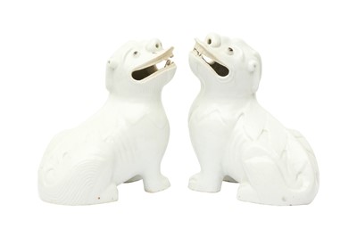 Lot 504 - A PAIR OF CHINESE DEHUA 'LION DOG' FIGURES
