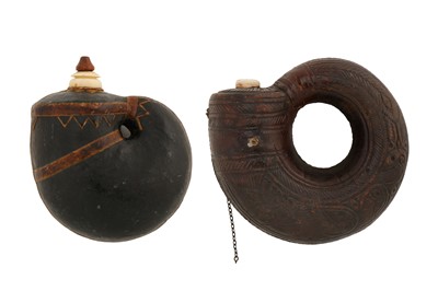 Lot 147 - AN EARLY 19TH CENTURY MUGHAL INDIAN LEATHER POWDER FLASK AND ANOTHER SIMILAR FLASK