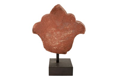 Lot 38 - A MUGHAL INDIAN CARVED RED STONE FINIAL
