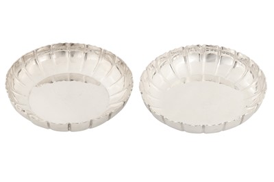 Lot 307 - A pair of George V sterling silver strawberry dishes, London 1914 by Daniel and John Welby