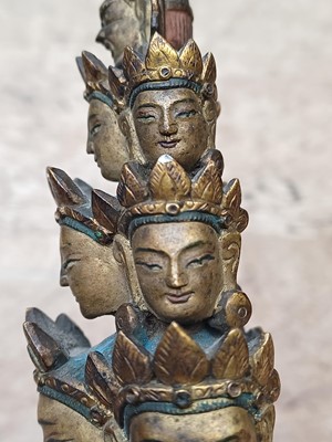 Lot 181 - A SINO-TIBETAN GILT-BRONZE FIGURE OF ELEVEN-HEADED EKADASAMUKHA AVALOKITESHVARA