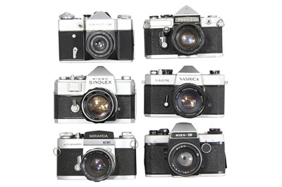 Lot 139 - Six Mechanical 35mm SLR Cameras with lenses.