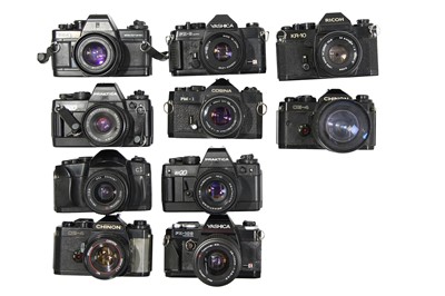 Lot 117 - Ten Electronic 35mm SLR Cameras With Lenses.