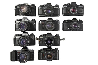 Lot 100 - Ten Electronic 35mm SLR Cameras With Lenses.