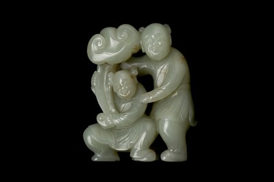 Lot 136 - A CHINESE CELADON JADE 'BOYS' GROUP