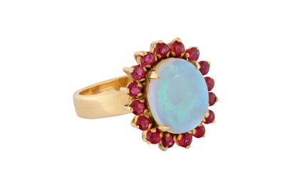 Lot 127 - AN OPAL AND RUBY RING