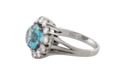 Lot 79 - A BLUE ZIRCON AND DIAMOND CLUSTER RING