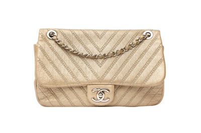 Lot 266 - Chanel Metallic Gold Chevron Stud Wars Flap Bag