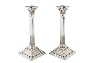 Lot 280 - A pair of Elizabeth II sterling silver candlesticks, Birmingham 1965 by Alexander Smith