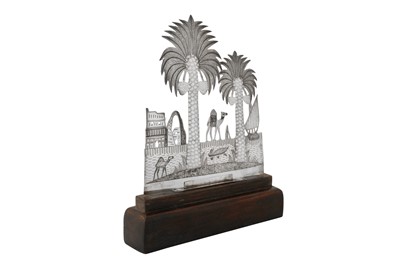 Lot 196 - A mid-20th century Iraqi silver and niello desk ornament, Basra circa 1960