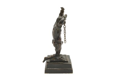 Lot 334 - AN ABOLITIONIST PATINATED BRONZE FIGURE OF A SLAVE IN CHAINS, 19TH CENTURY