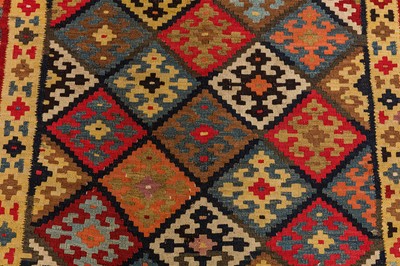 Lot 9 - AN ANTIQUE NORTH-WEST PERSIAN KILIM RUNNER