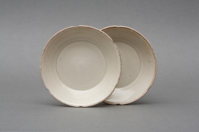 Lot 283 - A SMALL PAIR OF CHINESE DING-TYPE FOLIATE DISHES