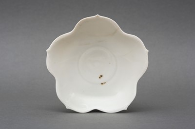 Lot 280 - A CHINESE DING QUATREFOIL DISH