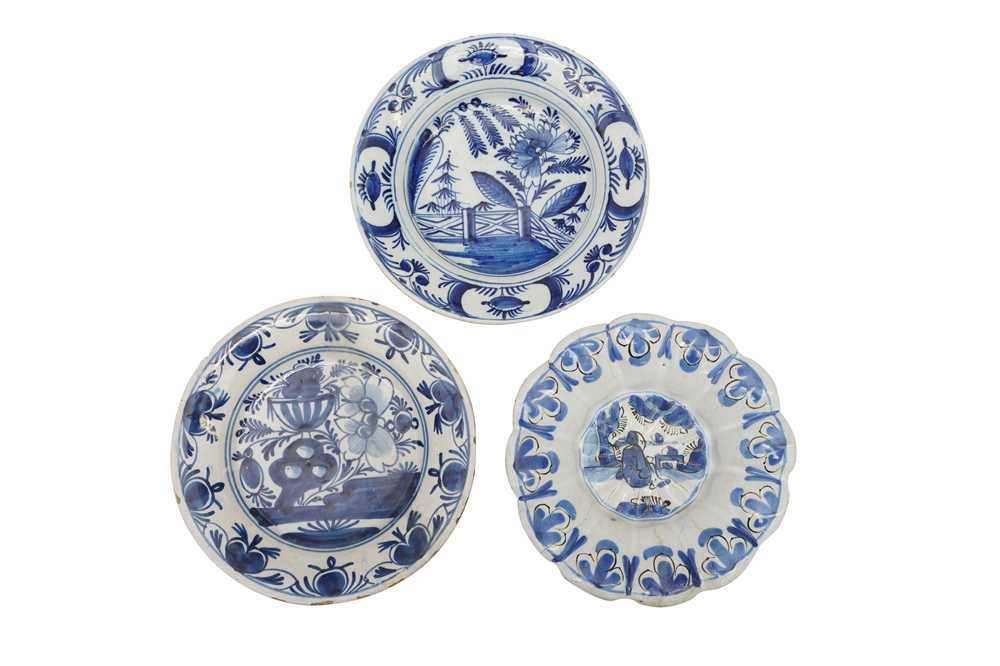 Lot 231 - TWO DUTCH BLUE AND WHITE DELFT PLATES, 18TH CENTURY