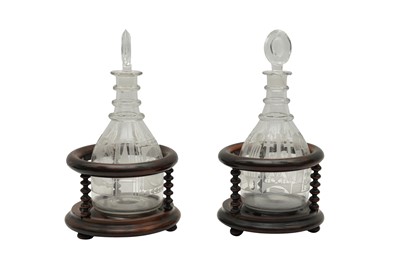 Lot 584 - A PAIR OF GEORGIAN MASONIC DECANTERS AND BOBBIN TURNED STANDS