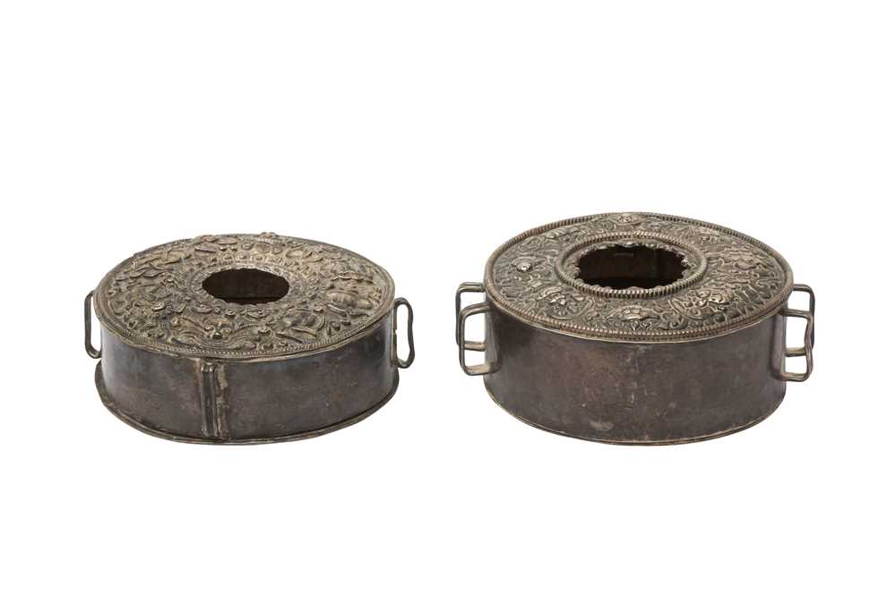 Lot 189 - A TIBETAN SILVER 'EIGHT AUSPICIOUS SYMBOLS' GAU TOGETHER WITH A SILVER AND COPPER 'EIGHT AUSPICIOUS SYMBOLS' GAU