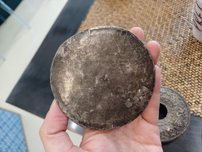 Lot 189 - A TIBETAN SILVER 'EIGHT AUSPICIOUS SYMBOLS' GAU TOGETHER WITH A SILVER AND COPPER 'EIGHT AUSPICIOUS SYMBOLS' GAU