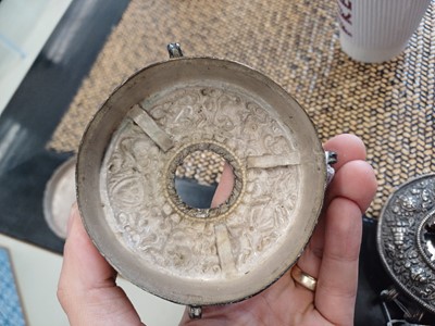 Lot 189 - A TIBETAN SILVER 'EIGHT AUSPICIOUS SYMBOLS' GAU TOGETHER WITH A SILVER AND COPPER 'EIGHT AUSPICIOUS SYMBOLS' GAU