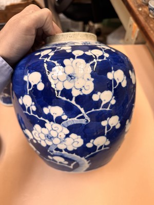 Lot 467 - A CHINESE BLUE AND WHITE 'PRUNUS' JAR AND TWO VASES