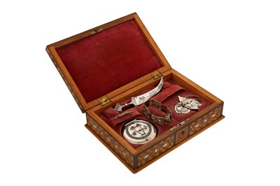 Lot 195 - A boxed collection of mid-20th century Iraqi silver and niello items, the compact Omara circa 1940 signed Salih