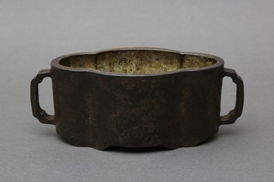 Lot 166 - A CHINESE BRONZE LOBED TWO-HANDLED CENSER, SHIJIA GUZHI MARK